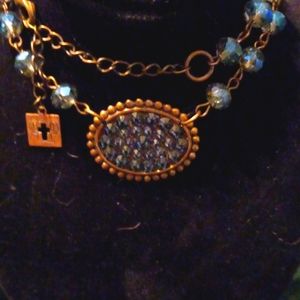 HUGE SALE Vintage beaded blue & gold pendant on blue beaded chain. EUC